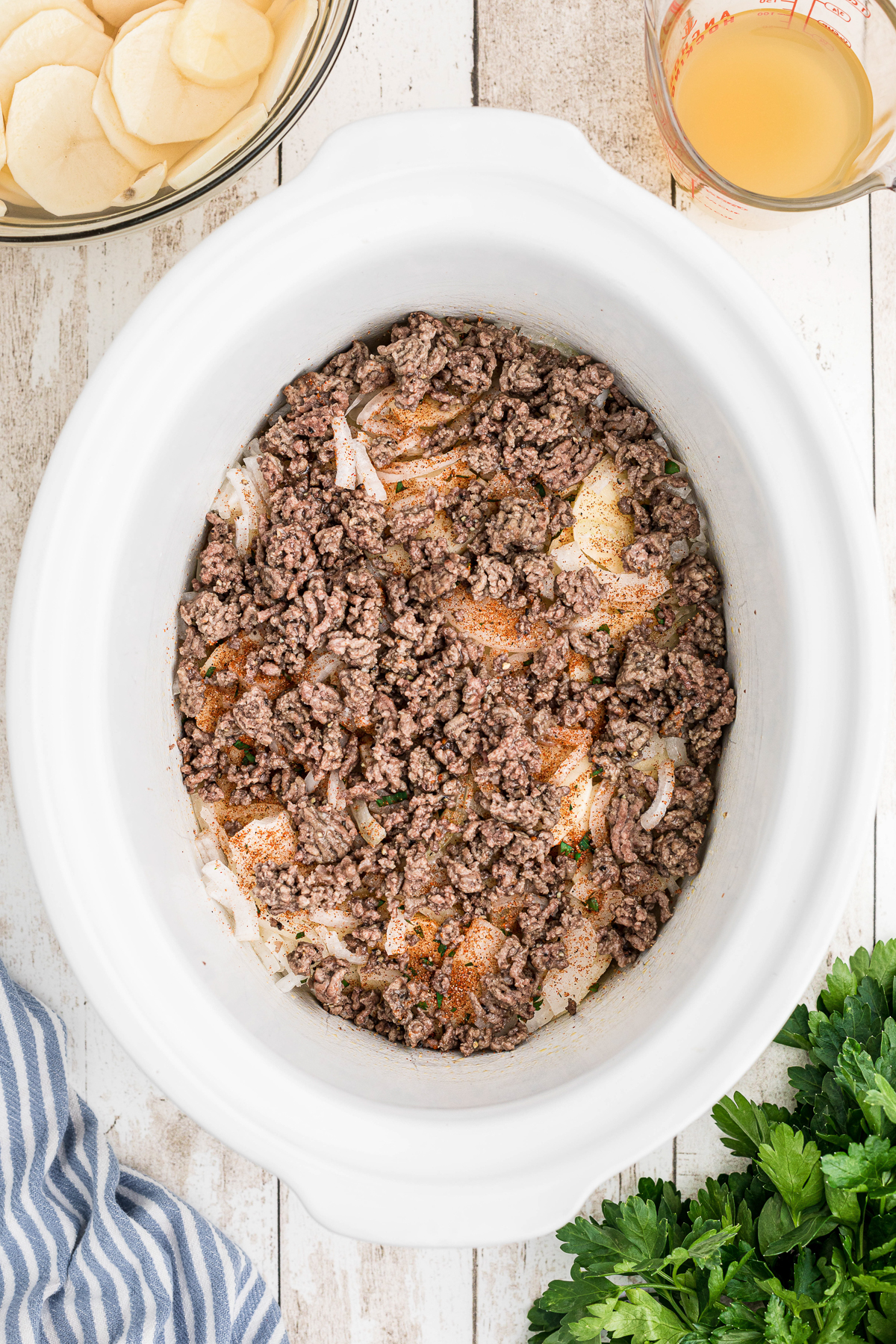 beef on top of those potatoes.