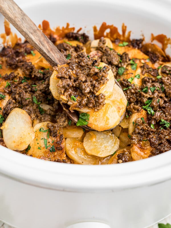 cooked beef and potatoes in a crockpot.