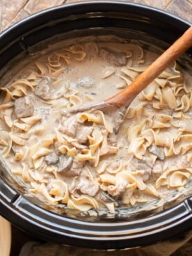 Beef stroganoff cooked with egg noodles in slow cooker.