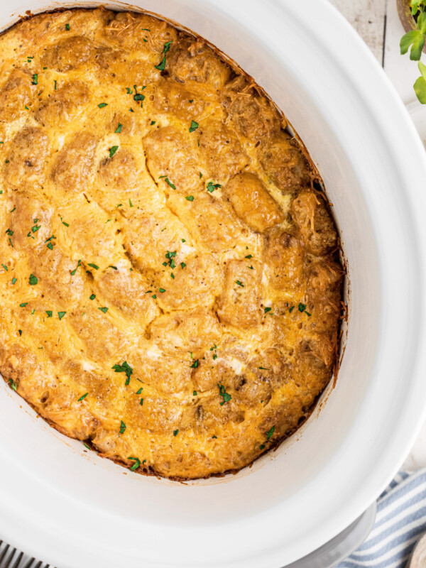 overhead shot of breakfast tater tot casserole in a slow cooker.