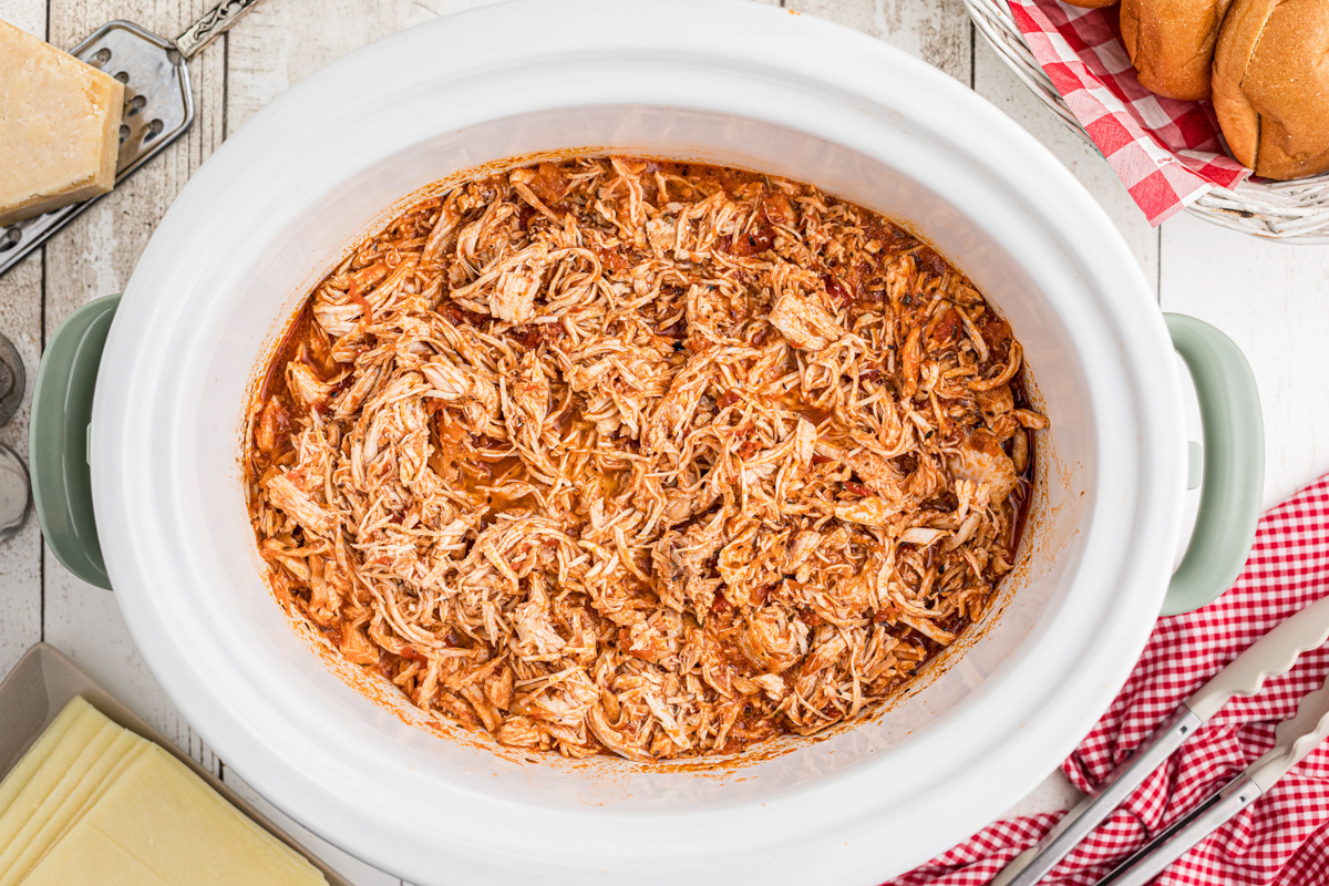 Chicken parmesan sandwich filling in a slow cooker.