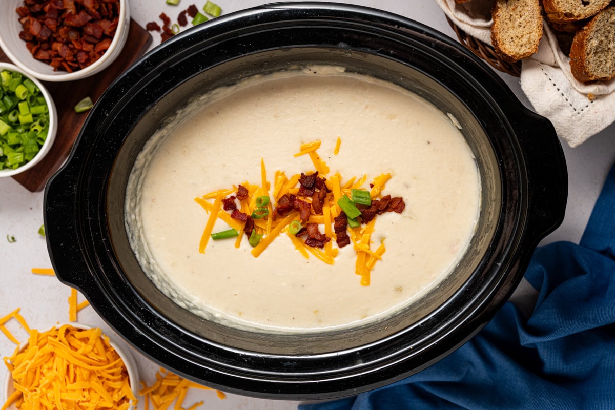 Hashbrown potato soup in a slow cooker.
