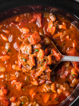 overhead shot of slow cooker hearty italian beef soup.