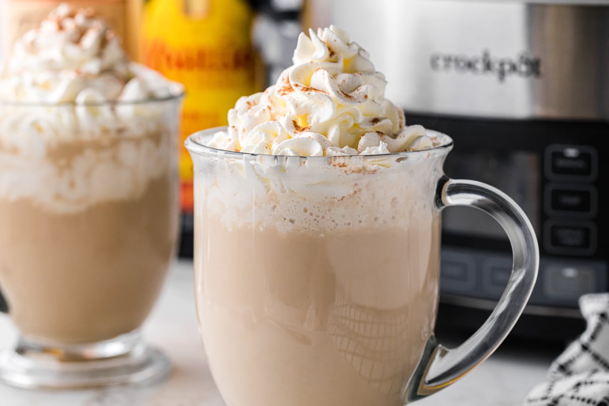 two slow cooker hot white russians in glass mugs.