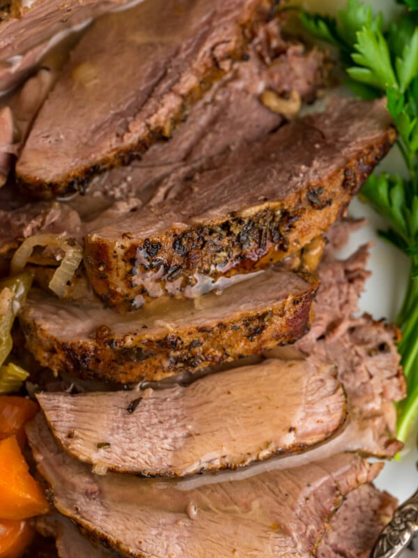 close-up shot of sliced slow cooker lamb.