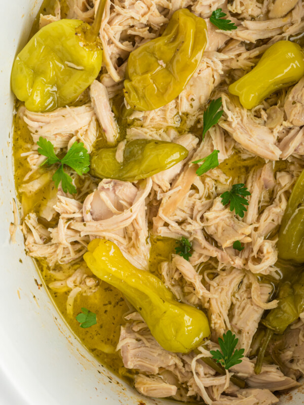 close-up overhead of mississippi chicken in a slow cooker.
