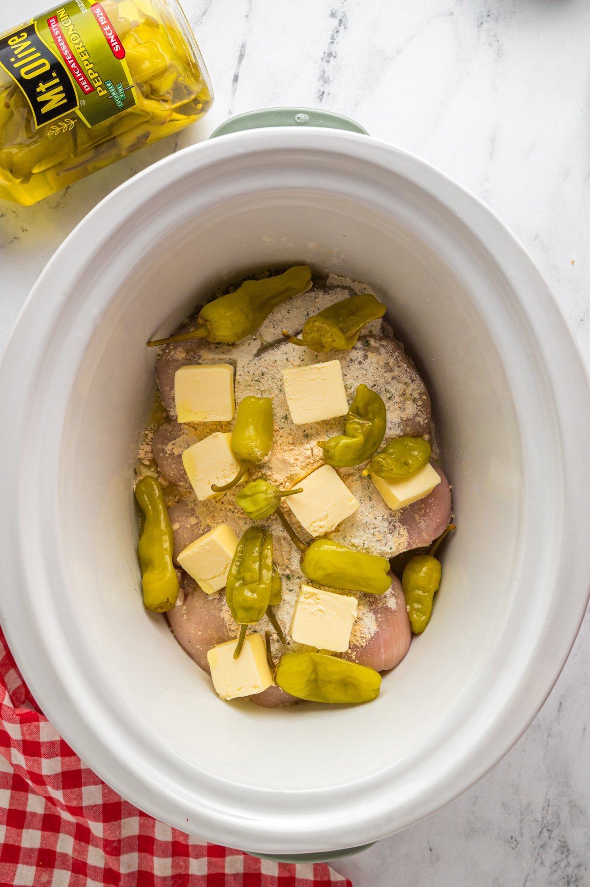 Chicken with butter, ranch, gravy and pepperoncini peppers.