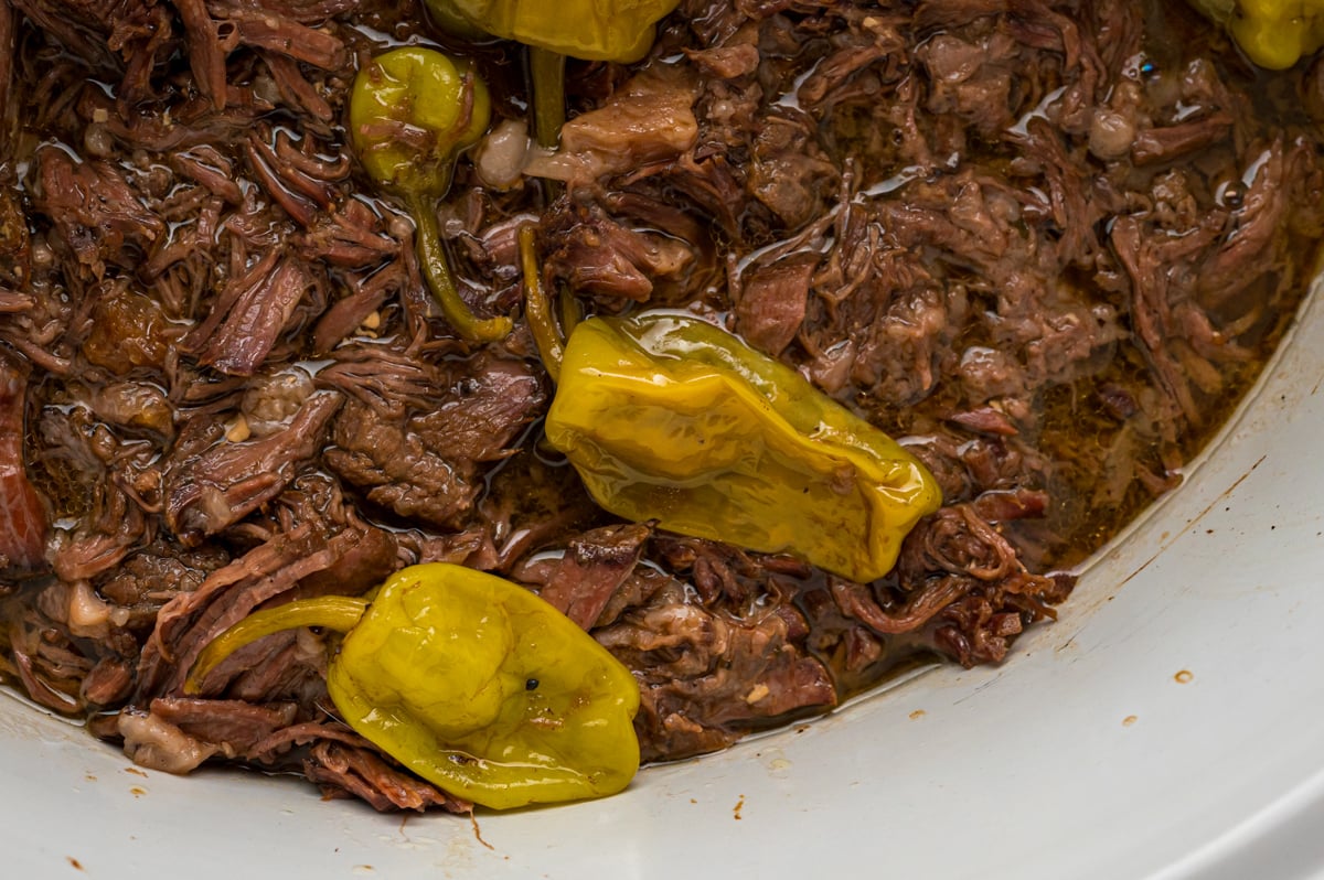 overhead shot of Mississippi pot roast in a slow cooker.
