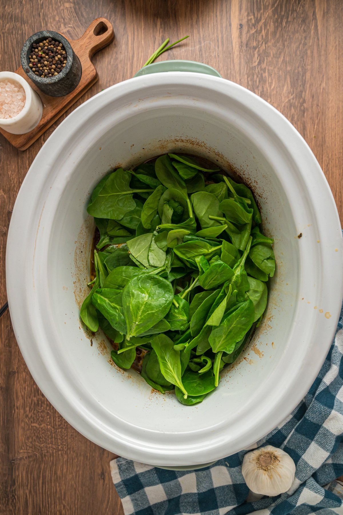 spinach on top of chicken.