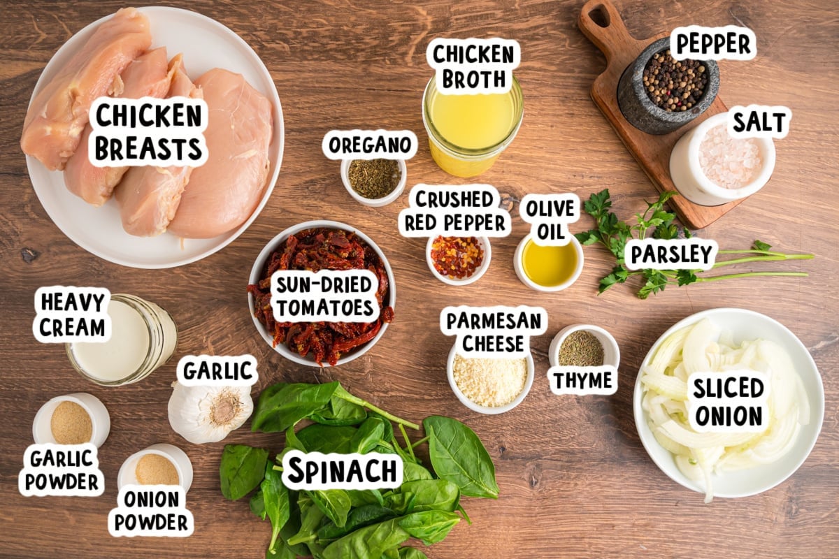 Ingredients for tuscan chicken on a table.